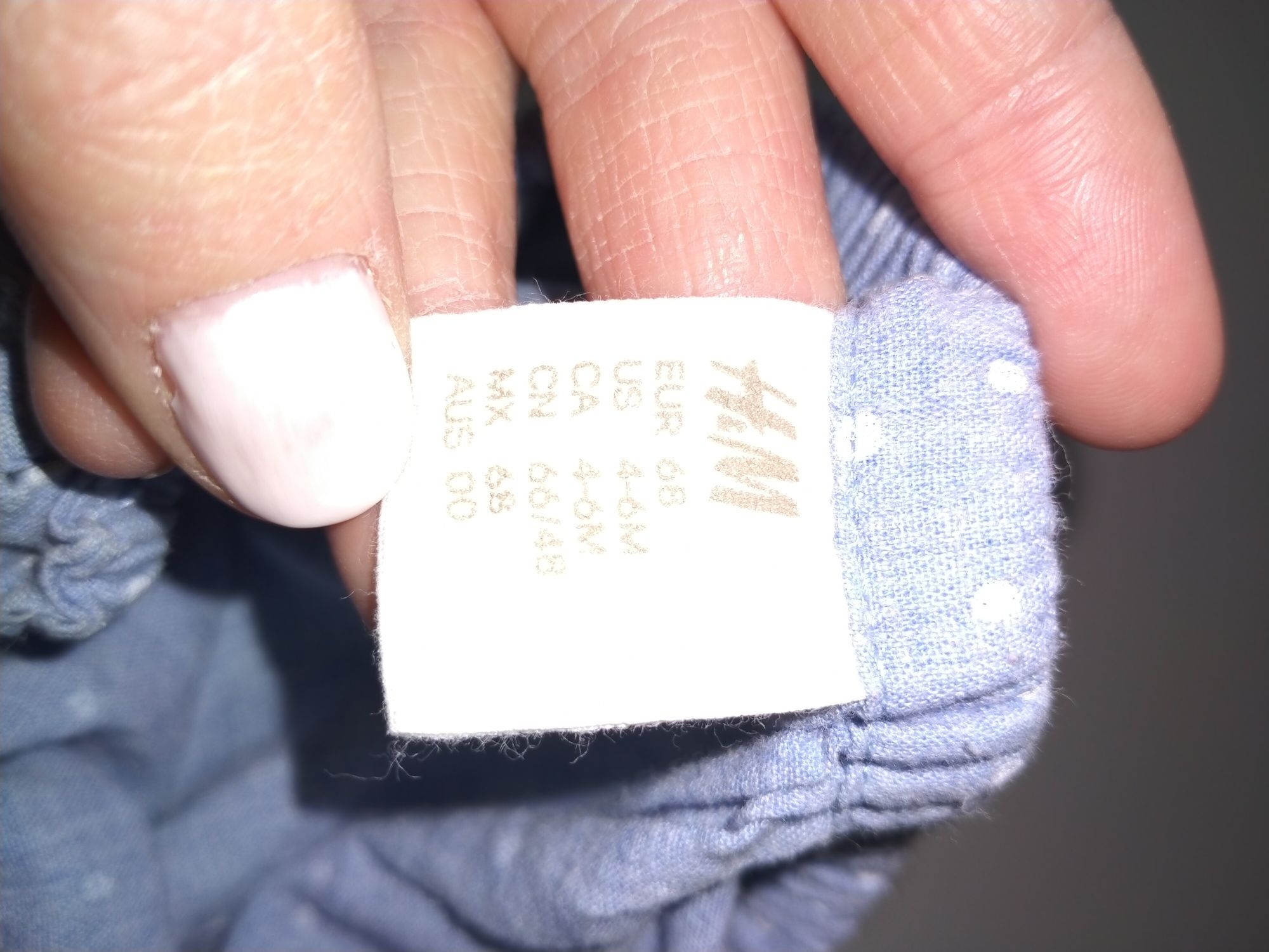 Kombinezon niebieski w białe kropki z H&M na lato rozmiar 68