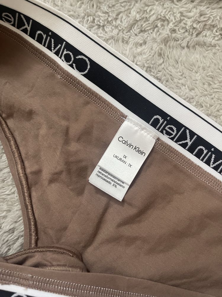 Трусы calvin klein modern cotton thong rich taupe