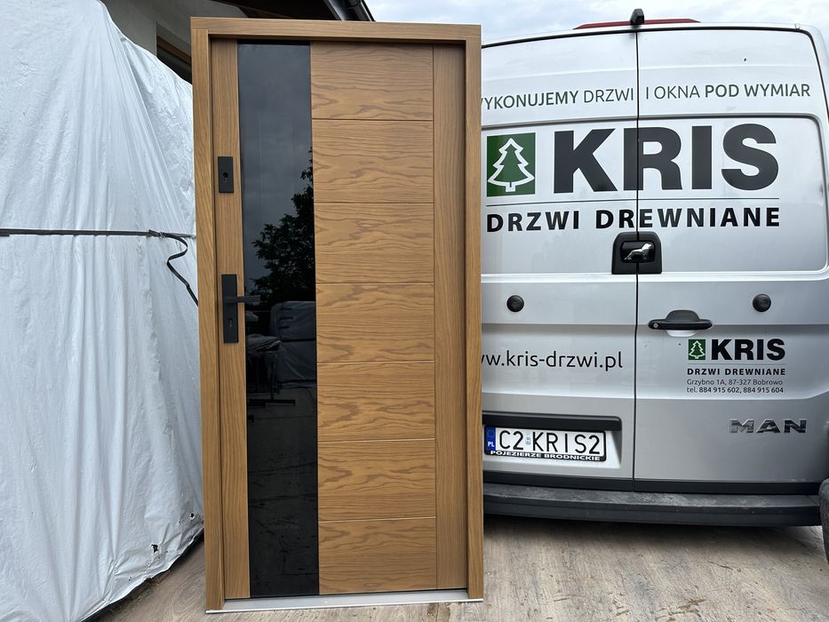 Drzwi zewnetrzne drewniane Montaż Cała Polska dębowe czarna szyba