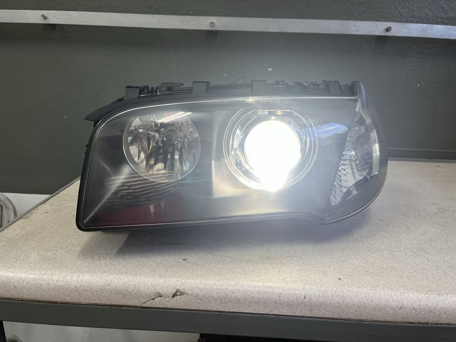 Bmw e83 X3 lampy skrętne bi xenon kompletne reflektory dynamic
