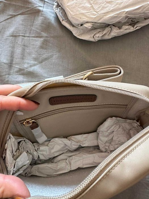 mala tommy nova e original