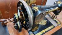 Máquina de costura singer
