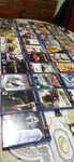 PlayStation 2 Slim com jogos..