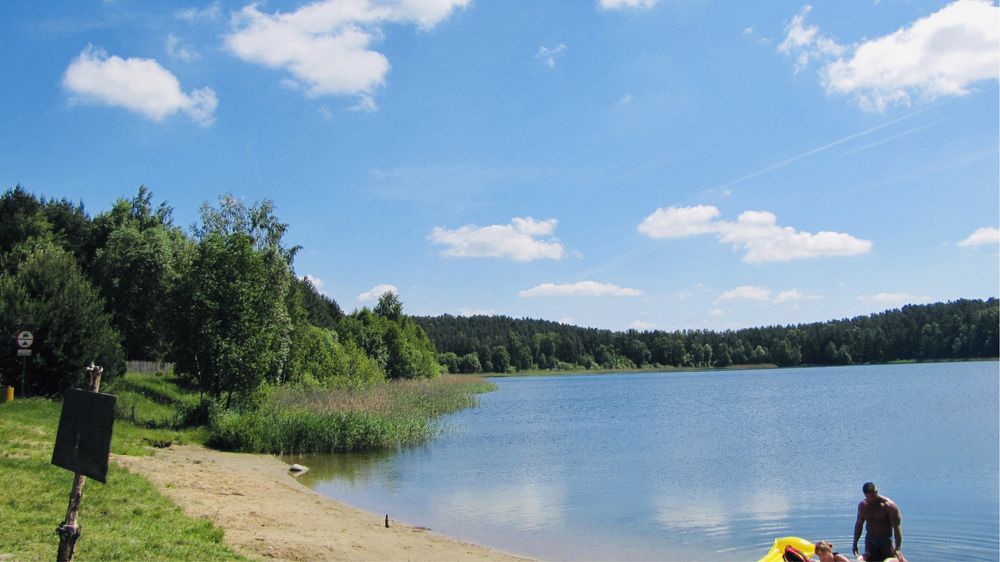 Domek nad jeziorem Warmia i Mazury. Las, łodka, kameralnie. Olsztyn