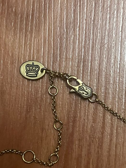 Ланцюжок з кулоном Juicy Couture.
