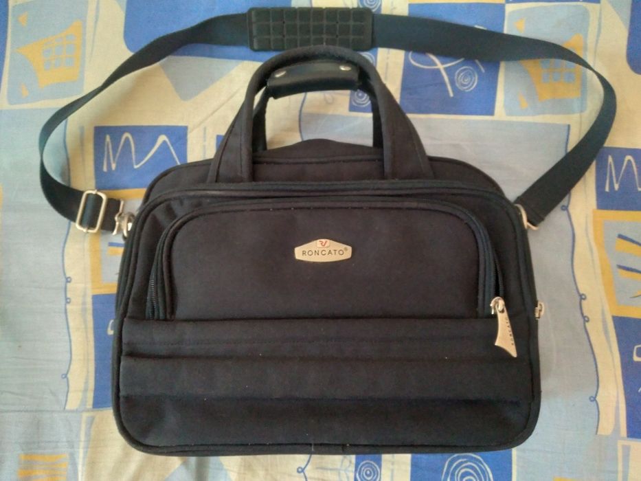 Продам фирменную дорожную/офисную сумку Roncato