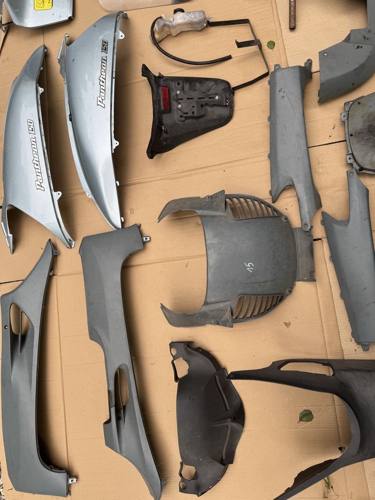 Honda Pantheon 150 125 owiewka lampa kierunkowskaz gaźnik króciec