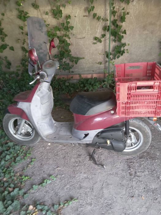 Продам скутер Ноnda  Topik, на ходу. С прицепом