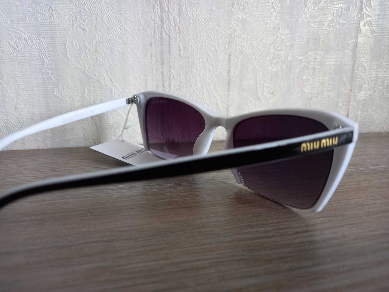 Солнцезащитные очки Miu Miu