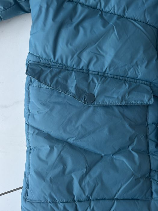 Куртка в блакитному кольорі