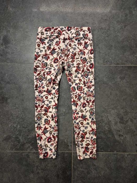 Białe wzorzyste spodnie Zara