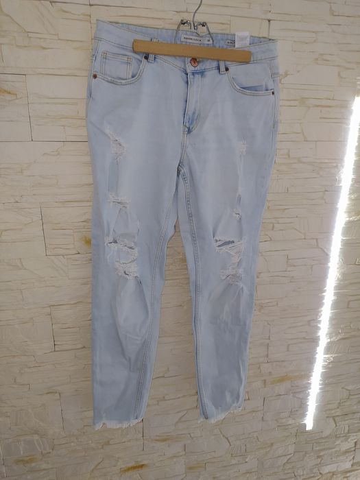 Jasne spodnie House roz 36 dziury przetarcia