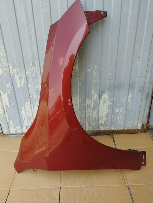 Błotnik prawy Volvo V60 S60 10-13 kol.702 igła