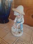 Menino Bibelô Porcelana