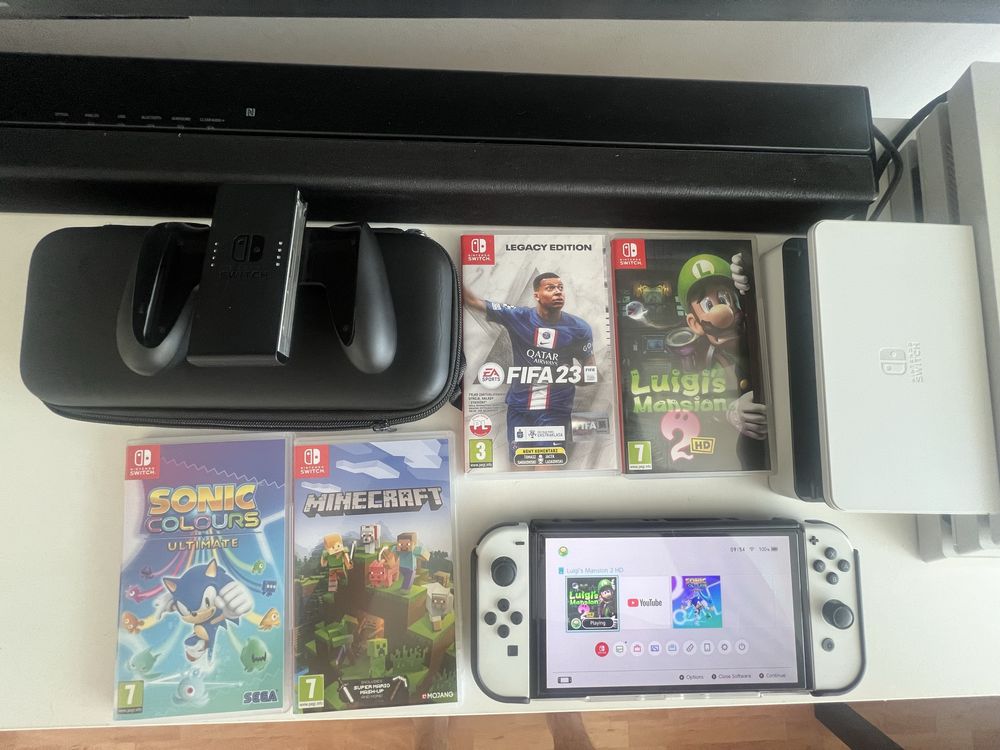 Nintendo Switch OLED + 4 GRY + ETUi + KARTA 128 + STACJA DOKUJACA BOX