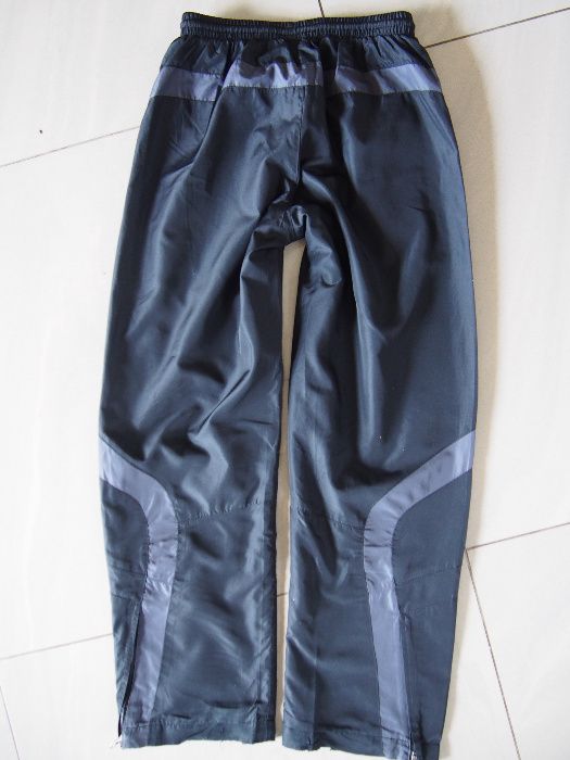 Spodnie 146 cm Umbro sportowe rozpinane nogawki