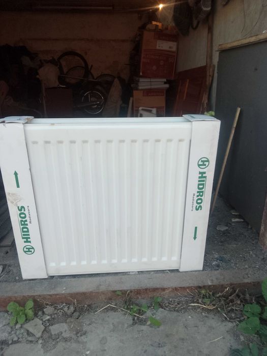 продам  новую  батарею  и   мойку  с краном  .