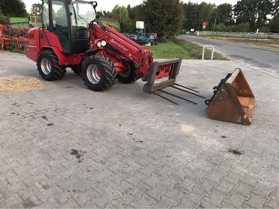 Ładowarka teleskopowa Schaffer 470 T łamana pół Weidemann zNiemiec JCB