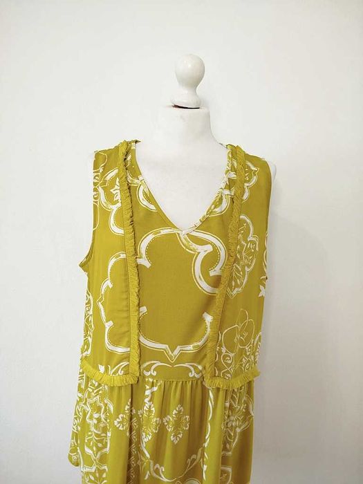 Next limonkowa bluzka z frędzelkami falbanka