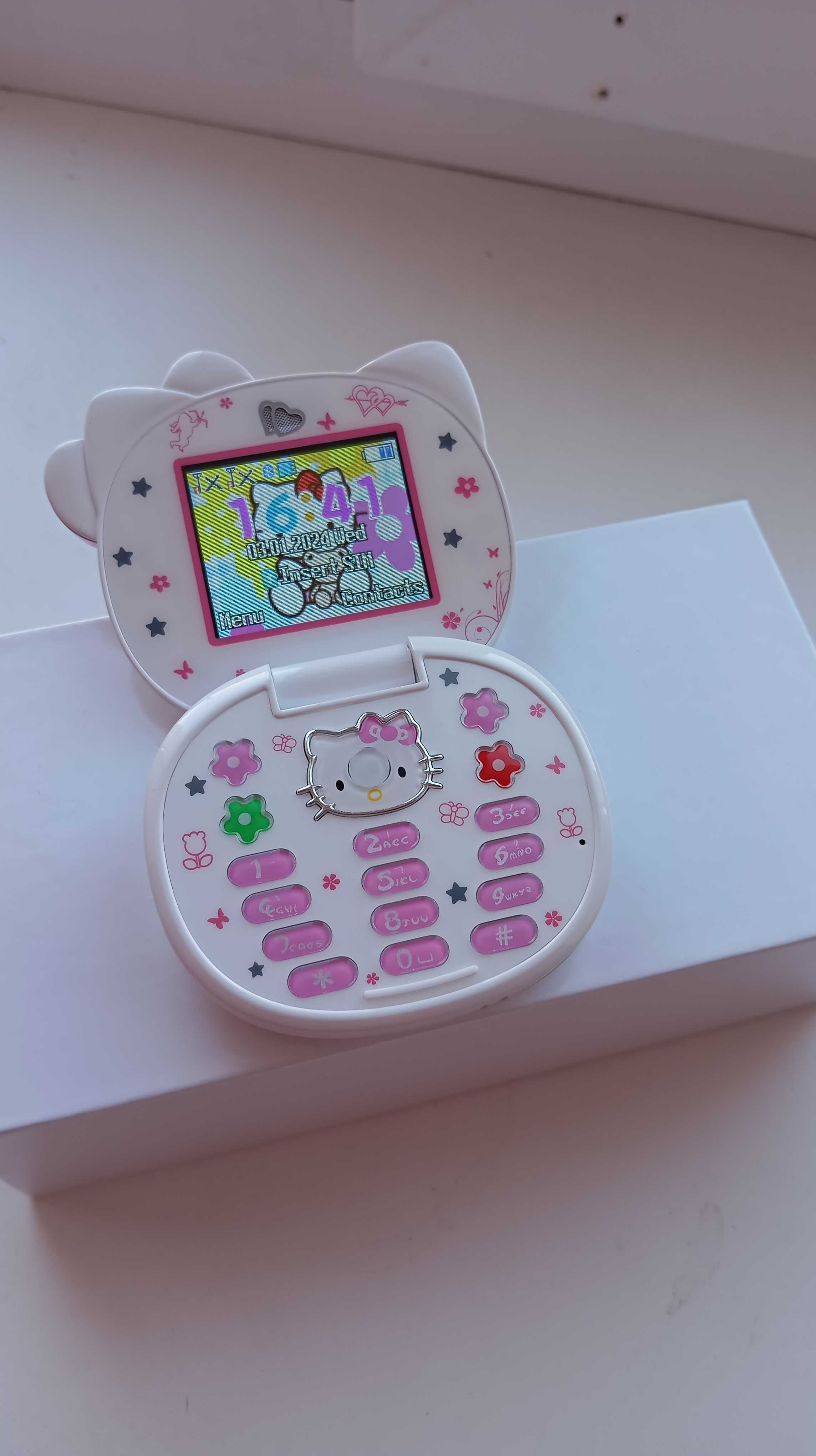 Новий телефон Hello Kitty K688+ White