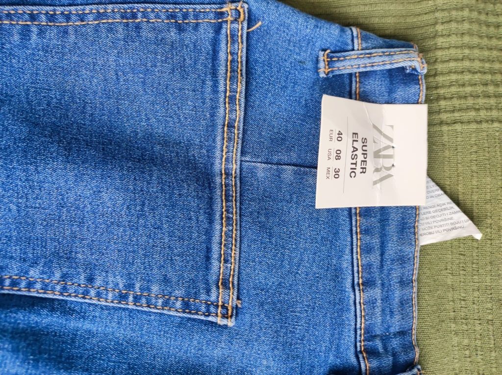 Nowe spodnie jeansowe Zara rozm. 40