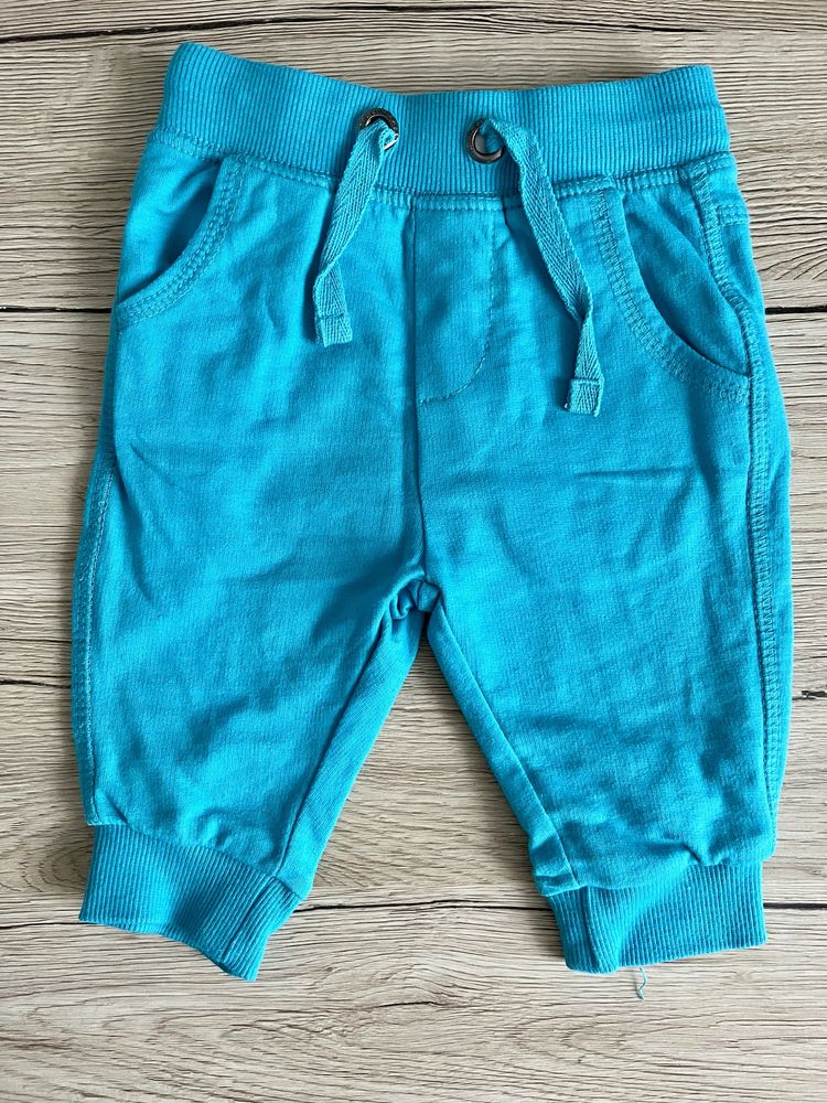 Sportowe dresowe spodnie niemowlęce niebieskie smyk cool club 62 nowe