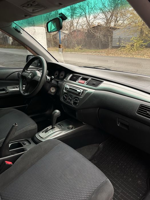 Продам лансер 9 автомат газ/бензин рестайлинг