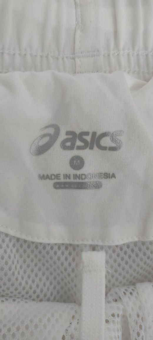 Kremowe spodenki sportowe ASICS