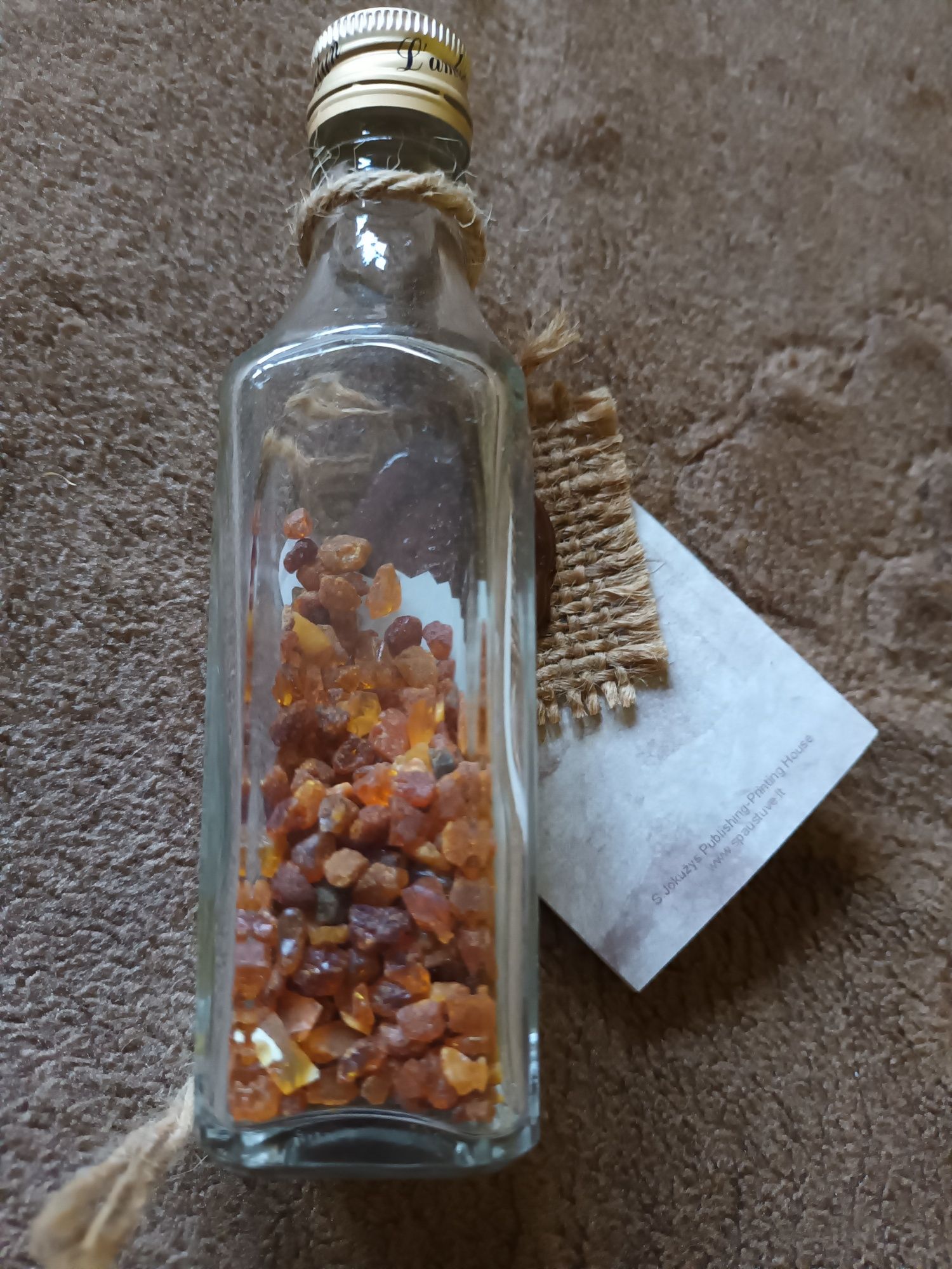 Buteleczka z drobinkami bursztynów Baltic Amber