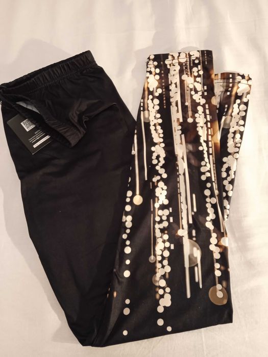 Legginsy damskie fitness czarno- brązowe ze wzorem. Nowe L