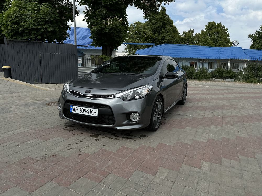 KIA Cerato Koup 1.6 T-GDi ( 204 л.с. ) 2014 год