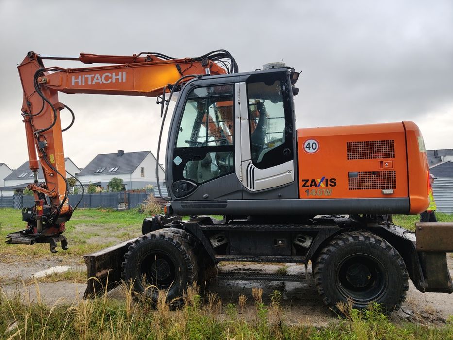 Koparka kołowa Hitachi ZX 140 rototilt kleszcze podpory