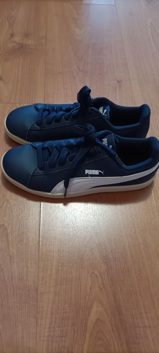 Tennis puma azuis escuros em pele
