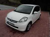 SUBARU JUSTY-DAIHATSU SIRION poj.998cm sam. osob.z LPG 2010 ROK.