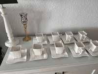 9 porcelanowych  filizanek z podstawkami