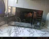 Microondas qilive preto e inox