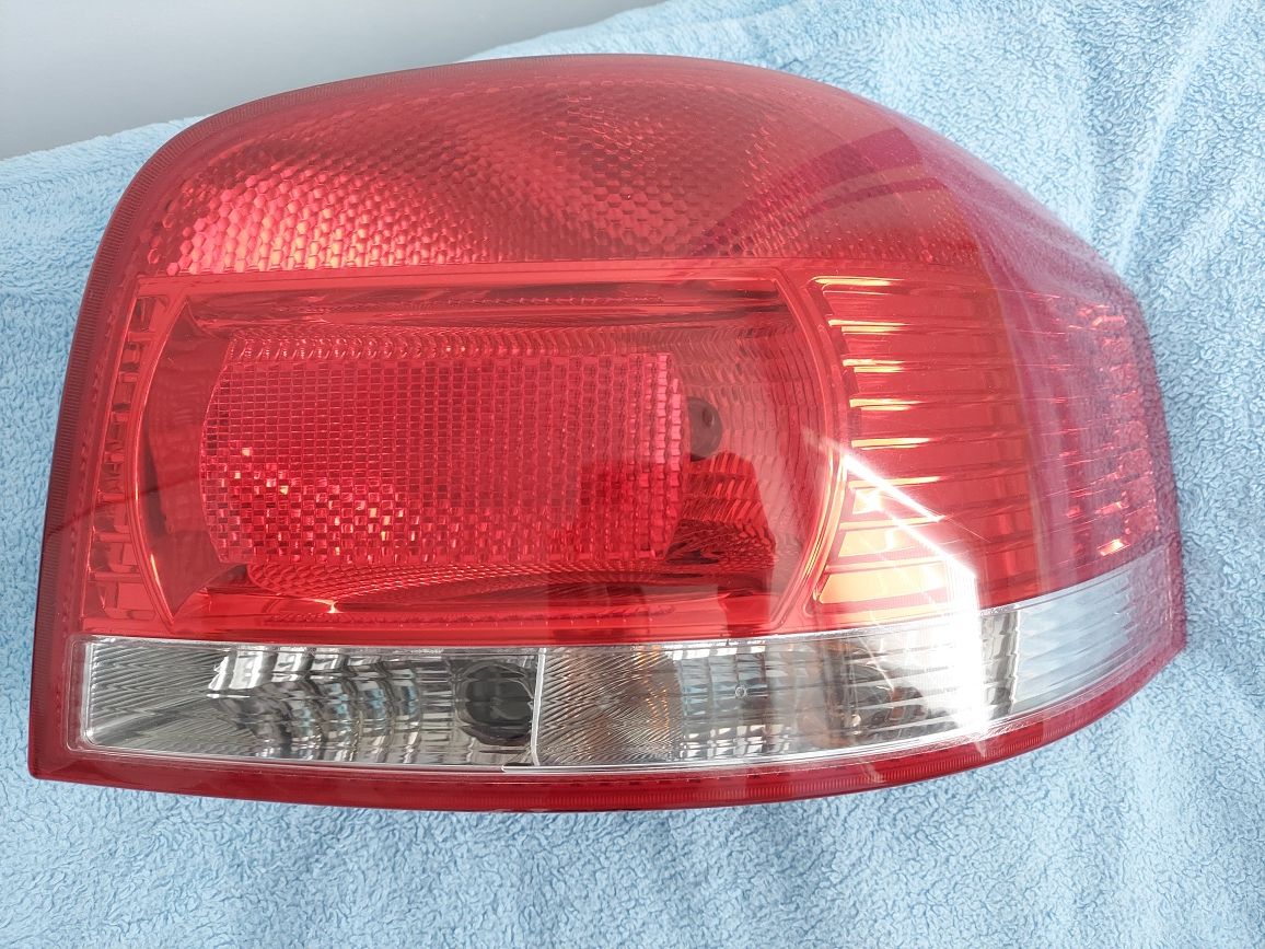 Lampy tylne Audi A3 8P 3D - oryginalne, wersja EU z wkładami