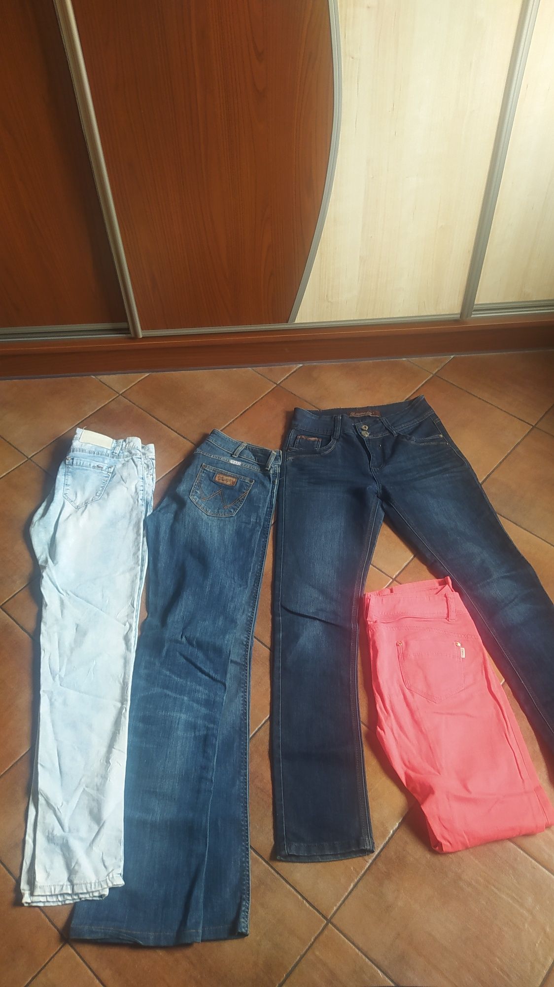 Sprzedam 12 par damskich  jak Nowe spodnie jeans i materiał.r.38/40
