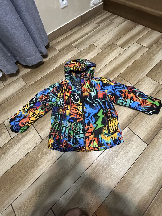 Яскрава зимова куртка Next в наявності