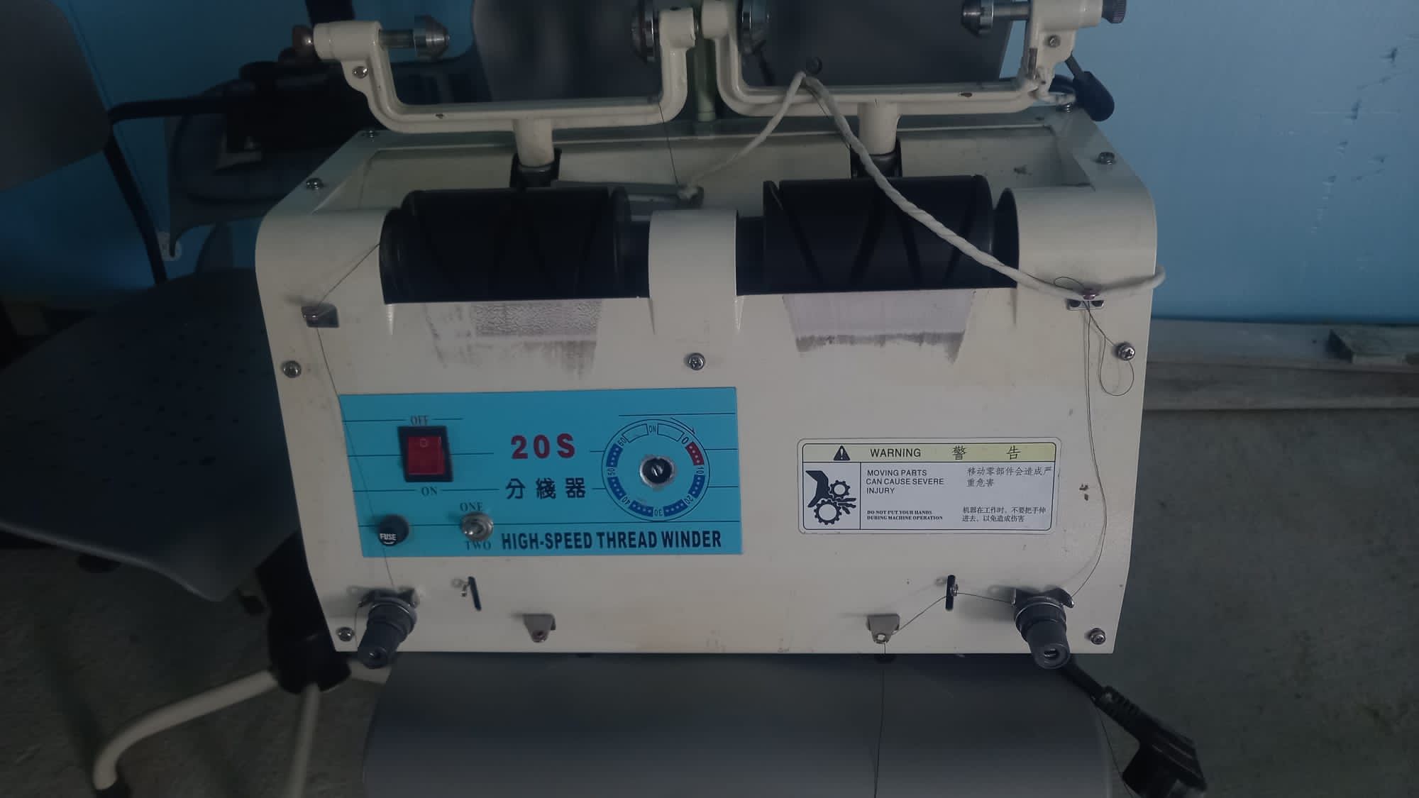 Máquina de passar linha