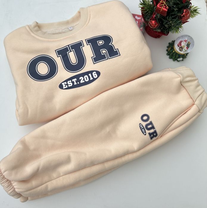 Продам утеплений штучним хутром костюм