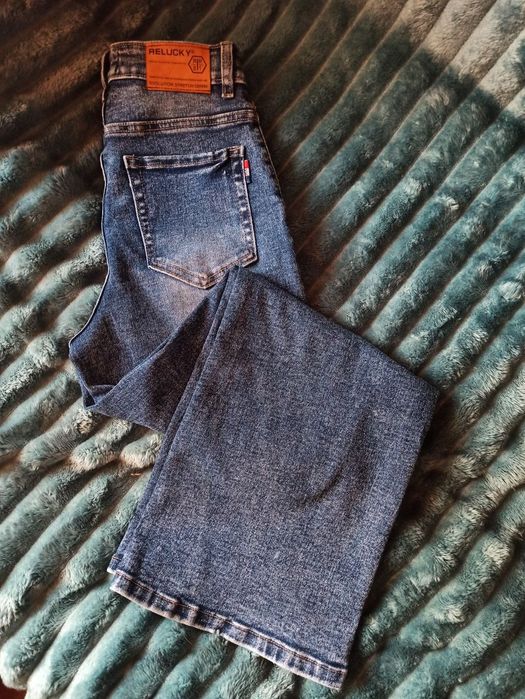 Жіночі джинси кльош