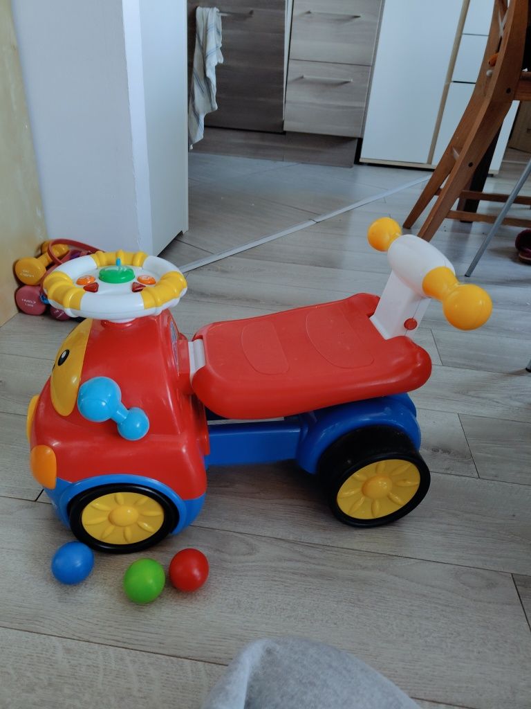 Jeździk auto smily z armatą na kołki strzela gra muzyka interaktywne