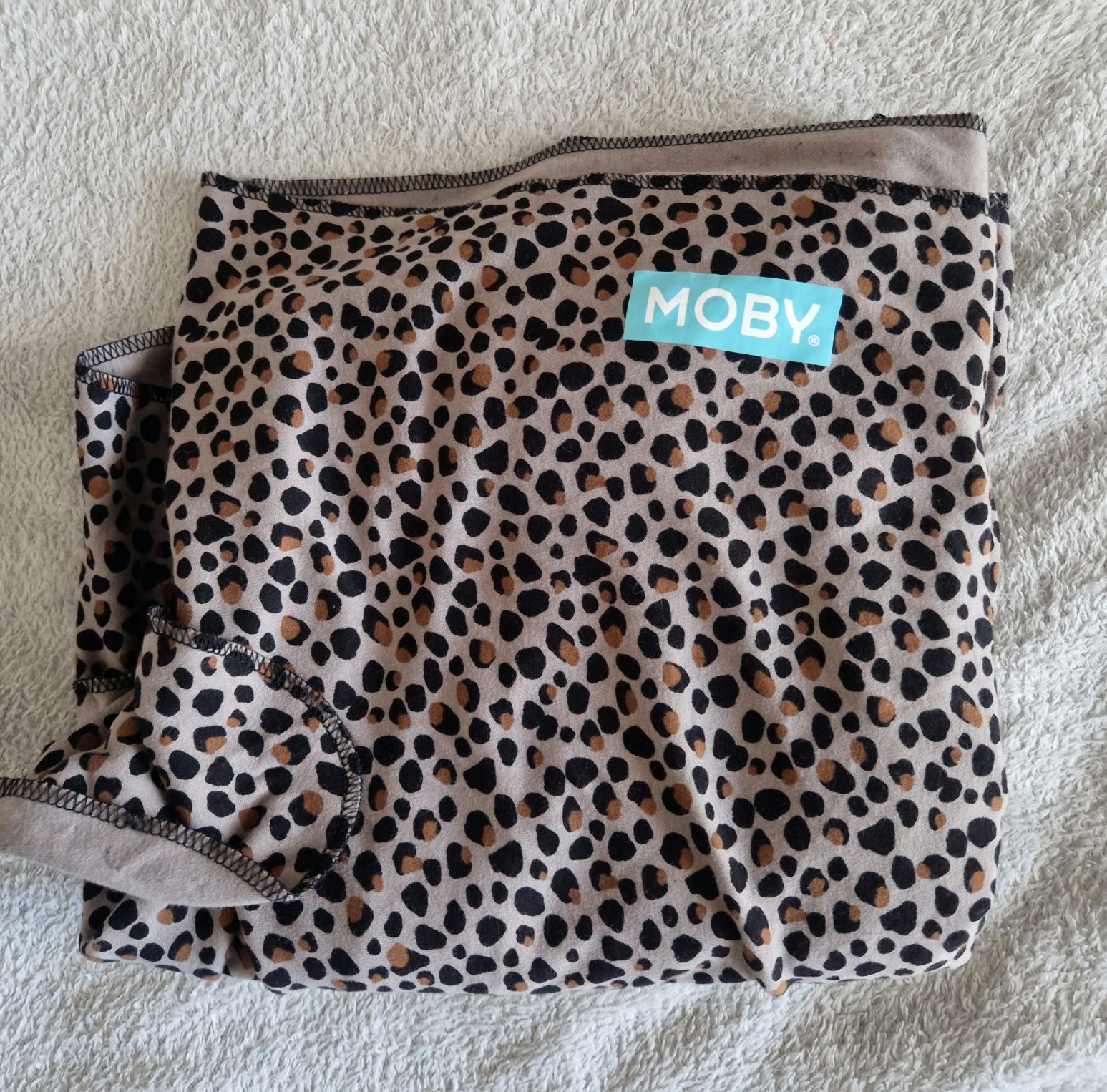 Elaastyczna chusta Moby do noszenia dziecka. Ergonomiczn