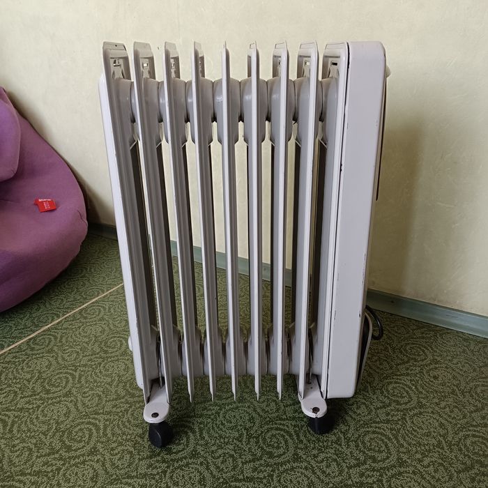 Масляный обогреватель De'Longhi