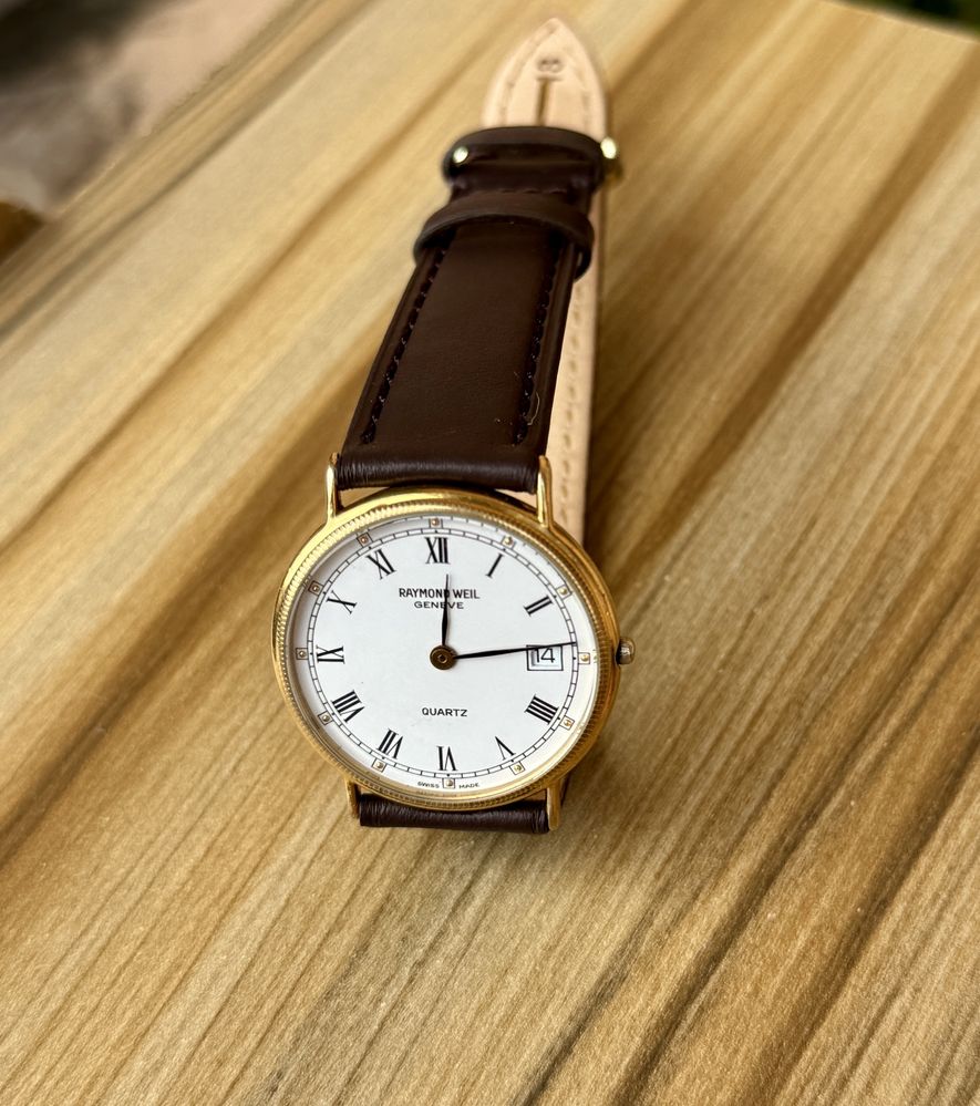 Raymond Weil годинник часы