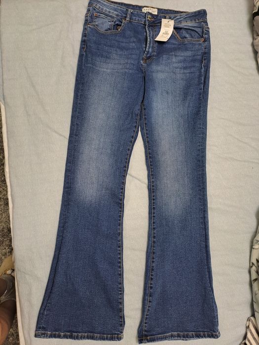 Нові стильні джинси (скіні кльош) на високий зріст розм 56-58