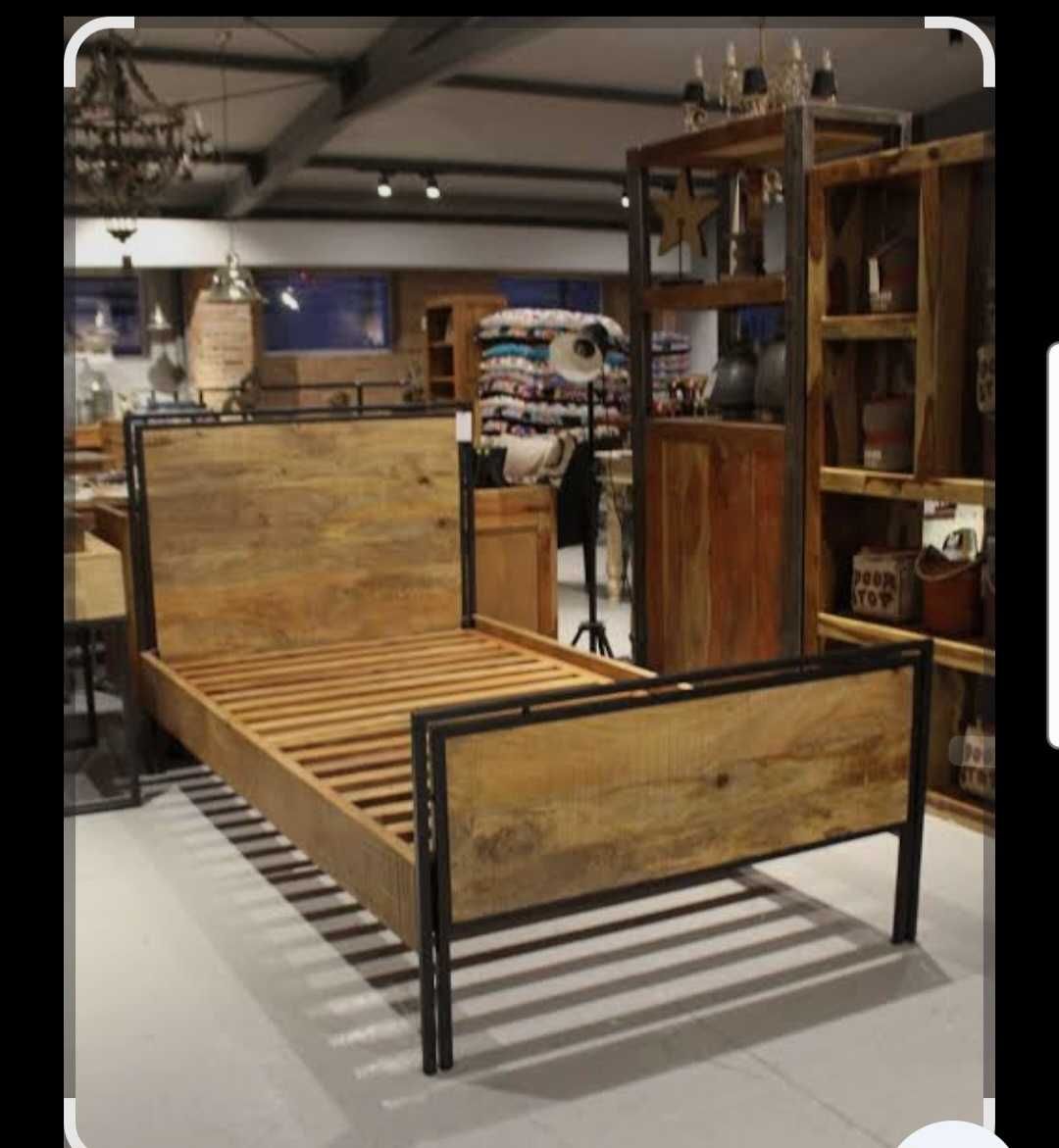 Komoda rtv i łóżko w stylu loft.