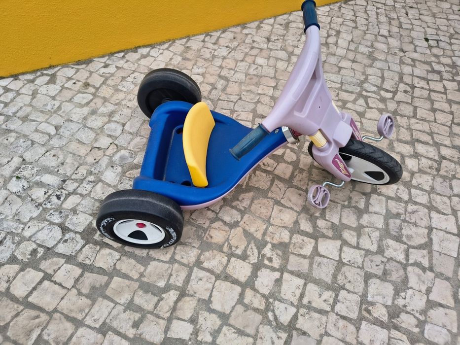 Radio flyer triciclo reversível