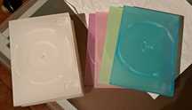 Caixas de DVDs (brancas e coloridas)